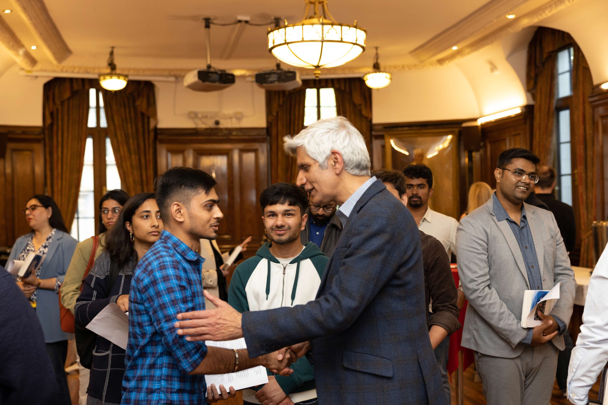 Hitendra Wadhwa interacting with participants at the High Commission of India, London