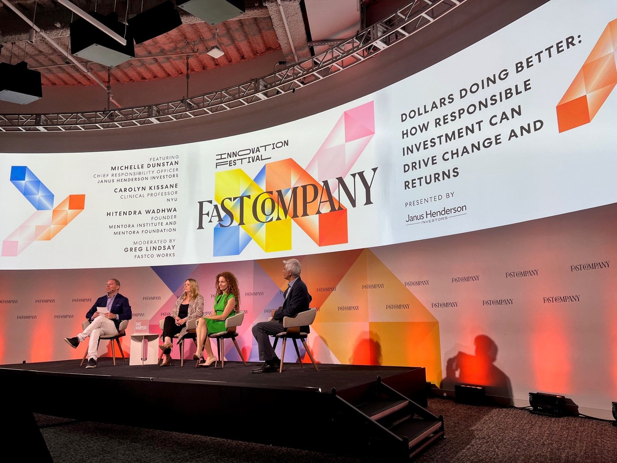 Hitendra Wadhwa and panelists sitting on stage at Fast Company event