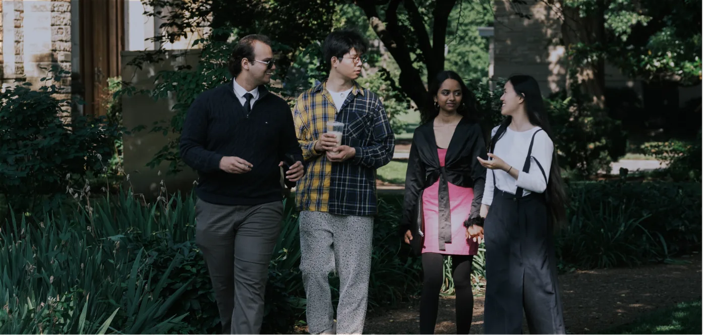 Mentora Scholars in conversation outdoors during the residential immersion